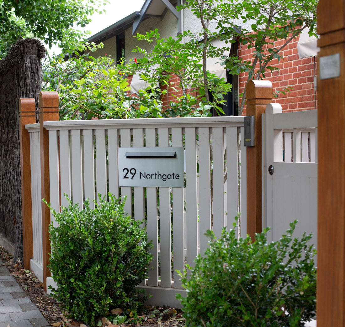 custom faceplate letterbox on picket fence