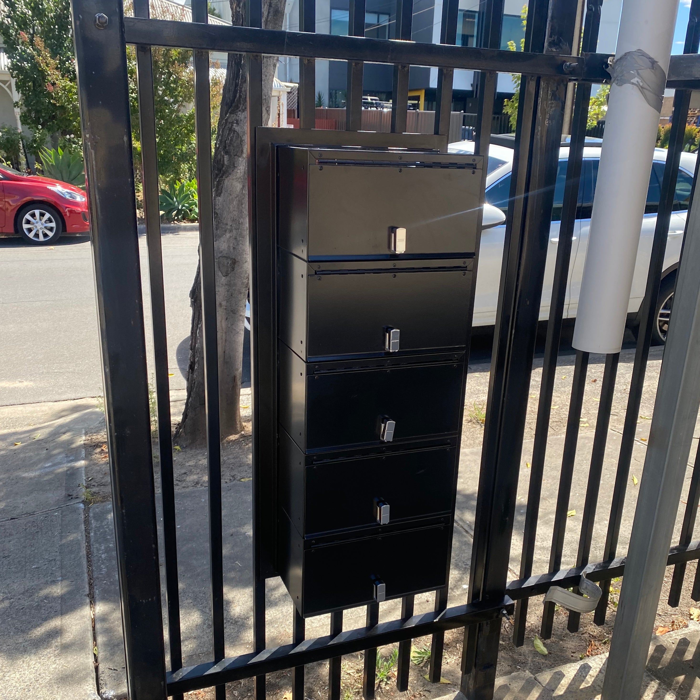 multibank letterboxes through fence rear opening